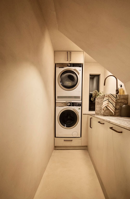 Laundry room with AEG washing machine